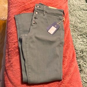New w/ tags - light sage  green skinny jeans - size 4